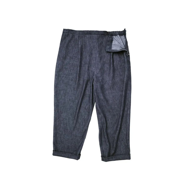 Pair of blue denim pants on a white background