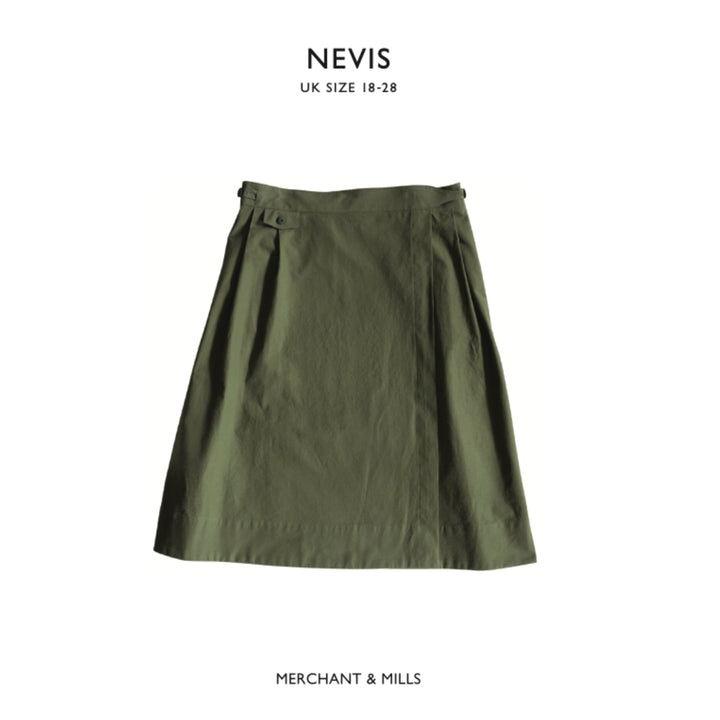 Green skirt with 'Nevis' and 'Merchant & Mills' branding on a white background