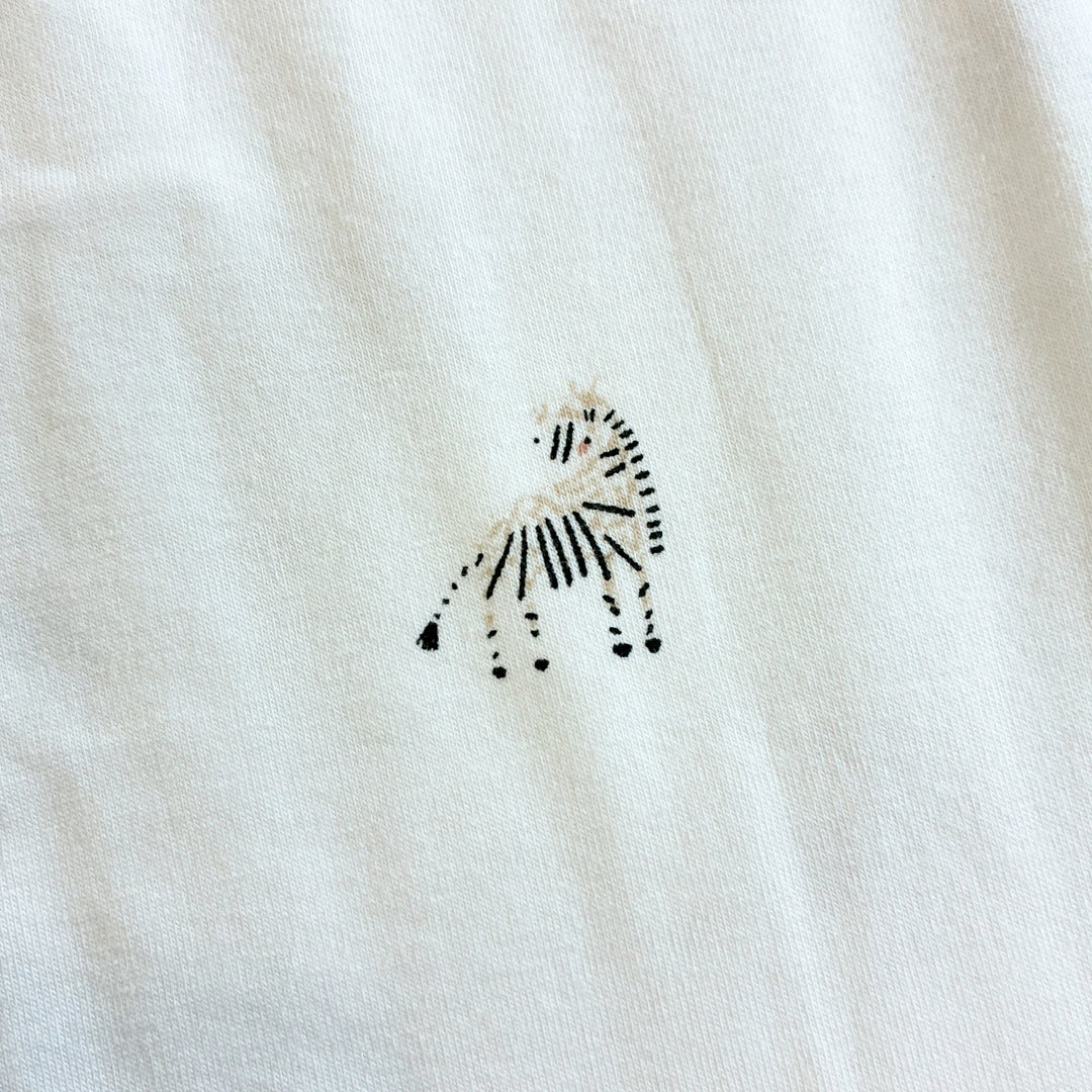 Blemished Safari Parade Cotton Jersey Fabric