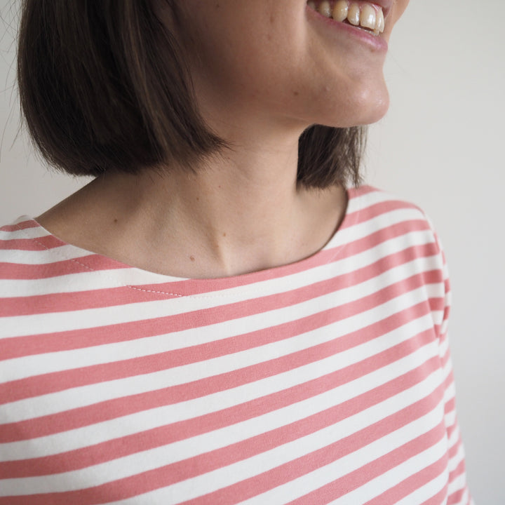 a close up image of the boat neck of the tilly and the buttons coco top