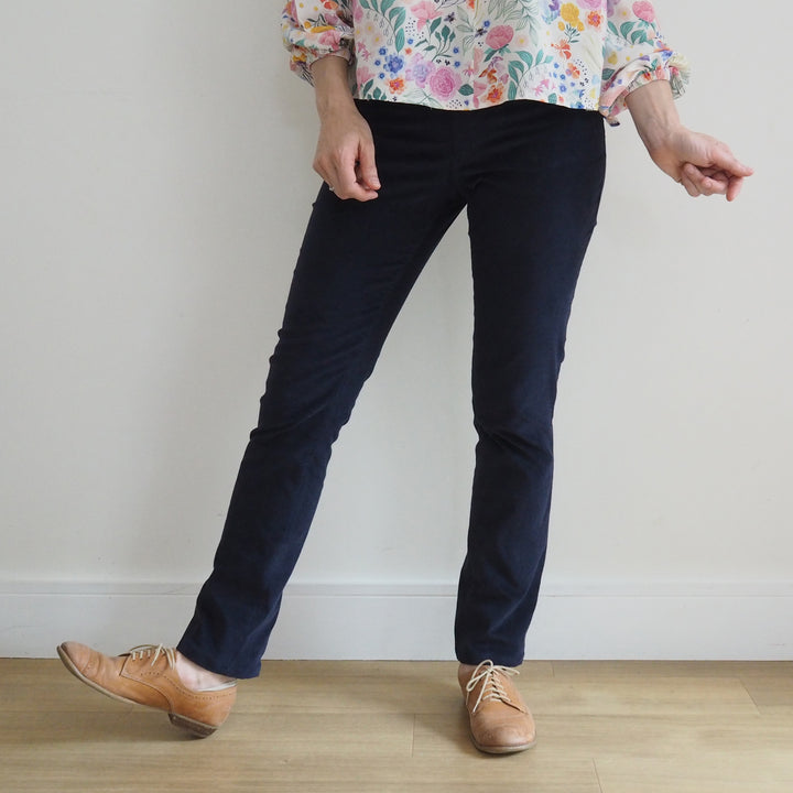 Clean front silhouette on Eleonore trousers with imitation pocket shaping