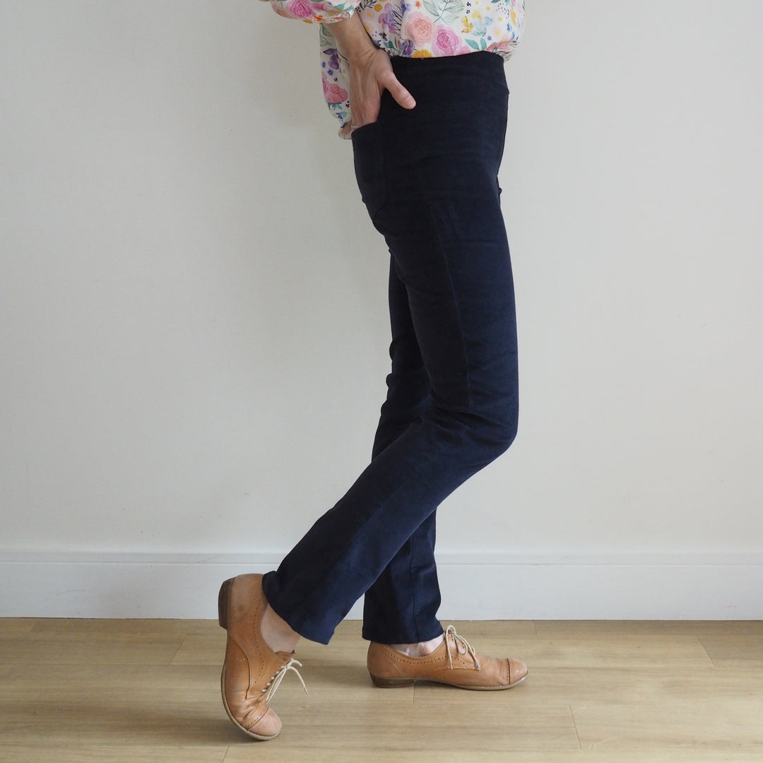 View from the side of the Eleonore stretch pull on trousers with mid rise fit and straight leg shape