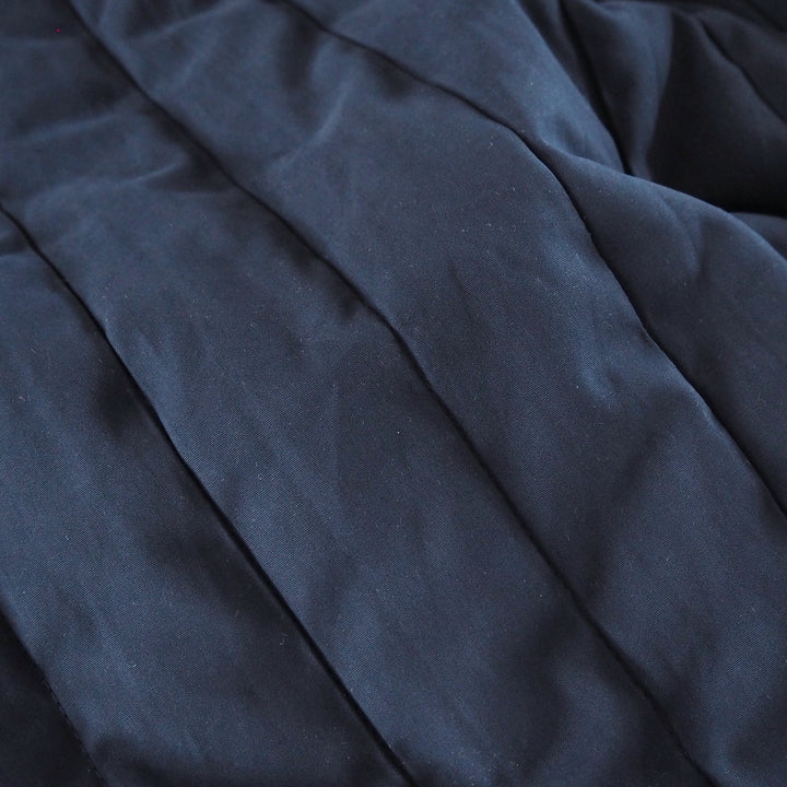 Mind The Maker Indigo Night Jordan quilted fabric with linear texture for jackets and coats.