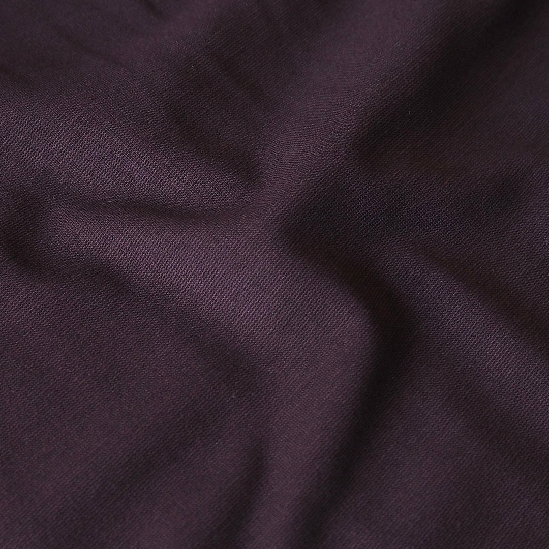 Plum light viscose ponte fabric with soft stretch for dressmaking.