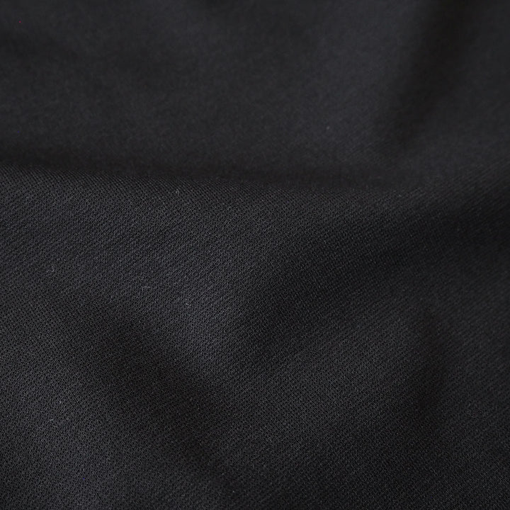 Black viscose ponte jersey fabric for dressmaking.