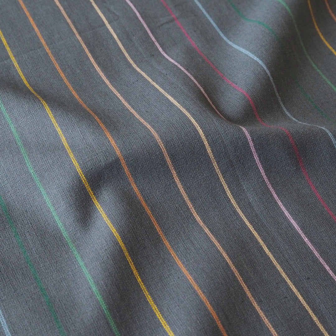 Fableism Dark Rainbow Skinny Stripe Cotton Fabric from the Lucky Loom Collection with multicoloured narrow stripes