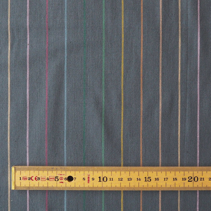 Fableism Dark Rainbow Skinny Stripe Cotton Fabric from the Lucky Loom Collection with multicoloured narrow stripes