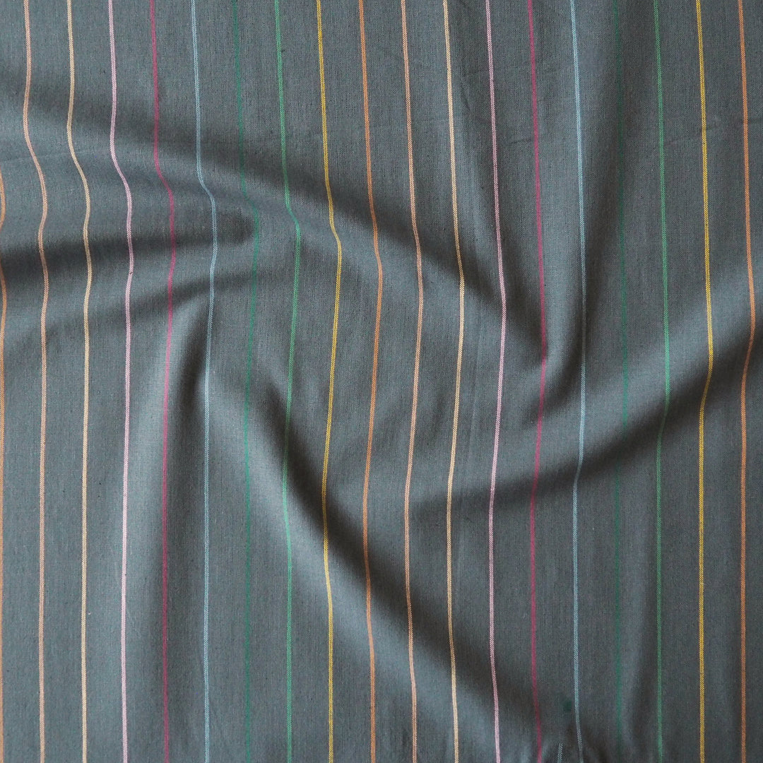 Fableism Dark Rainbow Skinny Stripe Cotton Fabric from the Lucky Loom Collection with multicoloured narrow stripes