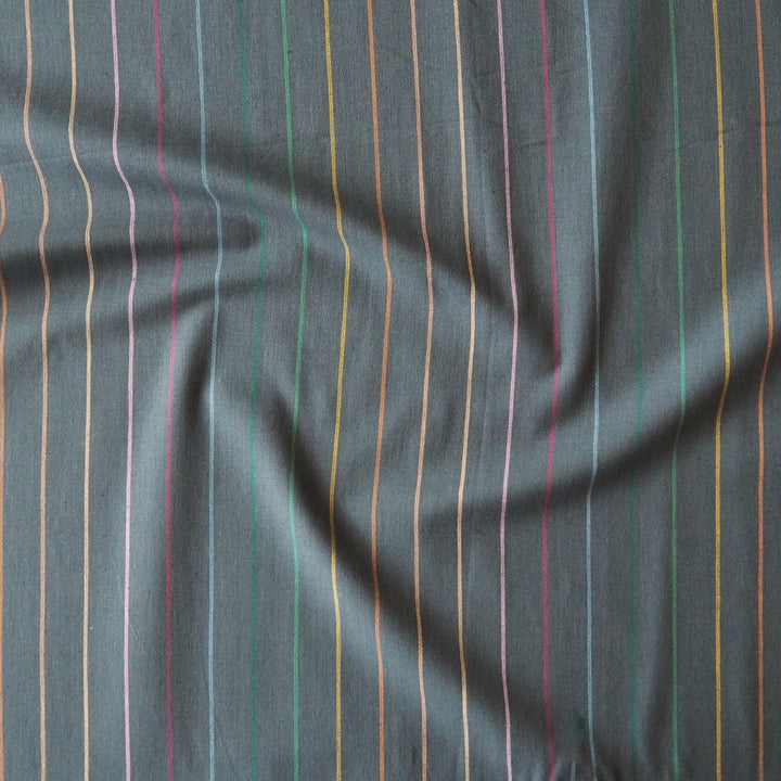 Fableism Dark Rainbow Skinny Stripe Cotton Fabric from the Lucky Loom Collection with multicoloured narrow stripes