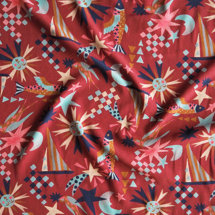 Fabric Godmother Soleil Maroon Viscose Crepe Fabric – maroon viscose crepe with celestial print