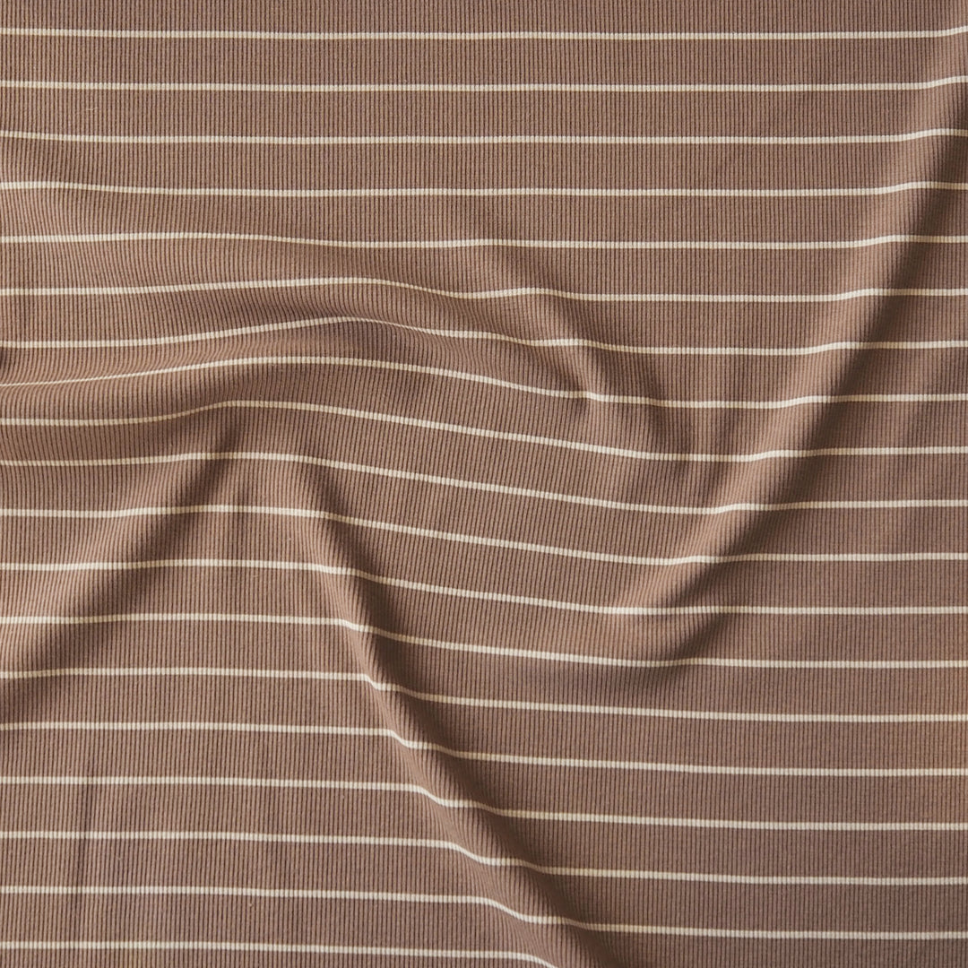 Brown striped ribbed jersey fabric with white stripes