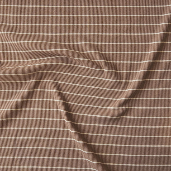 Brown striped ribbed jersey fabric with white stripes