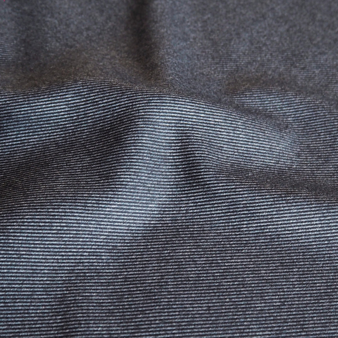 Muted denim stripe bamboo blended twill fabric in soft blue tones