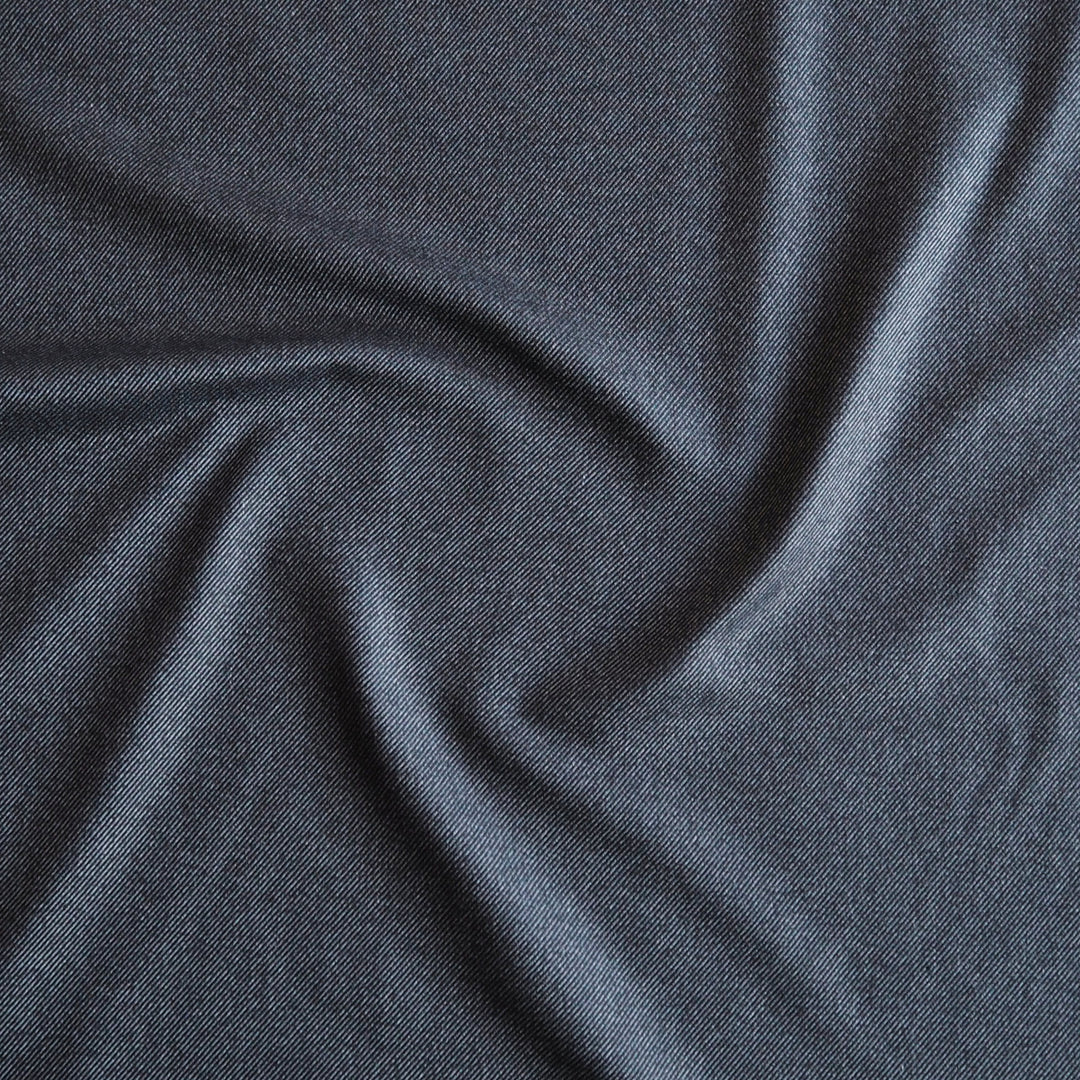 Muted denim stripe bamboo blended twill fabric in soft blue tones