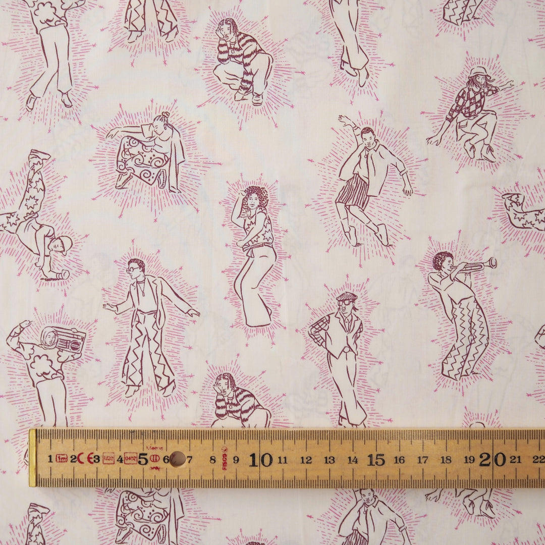 Patterned Liberty fabric with pink line drawings of people on a cream background