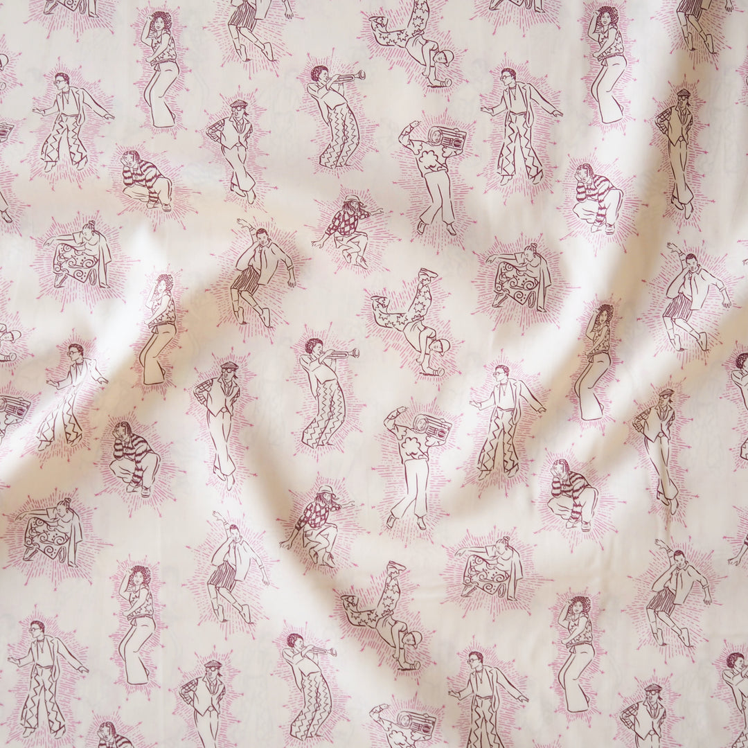 Patterned Liberty fabric with pink line drawings of people on a cream background