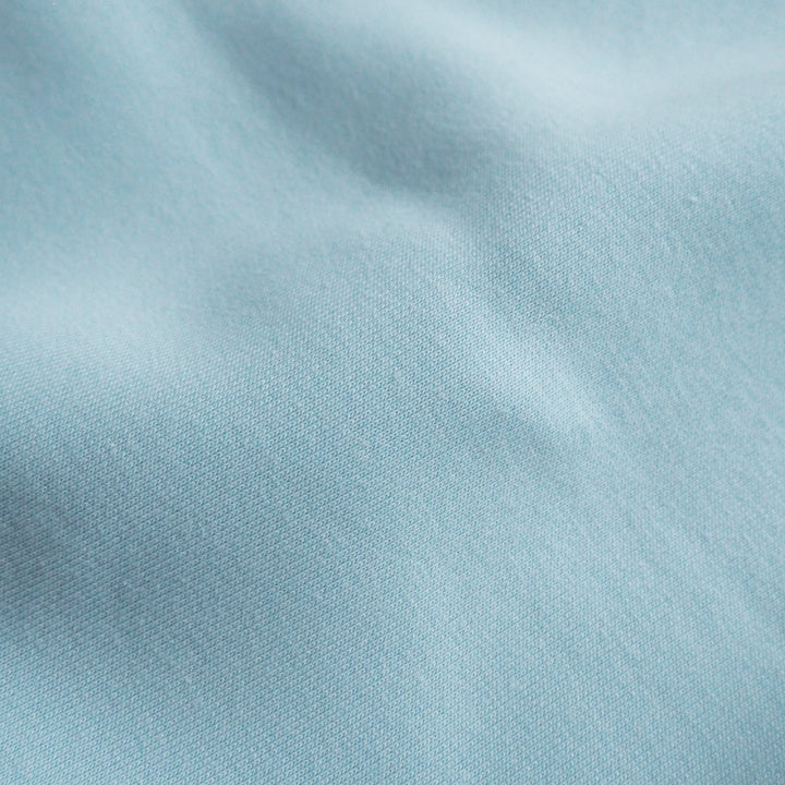 Close-up of light blue fabric texture