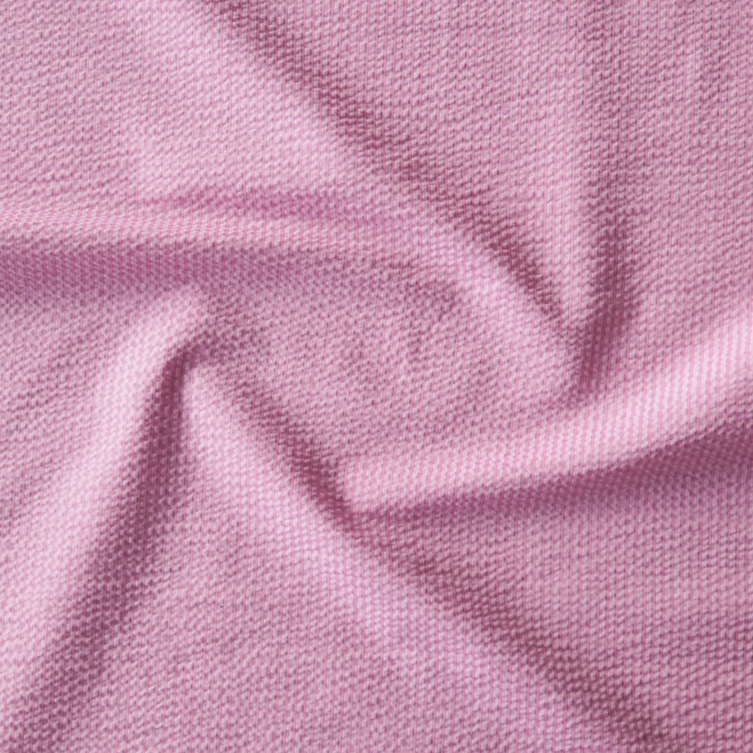 Pink striped cotton seersucker fabric with visible texture and subtle stripe pattern