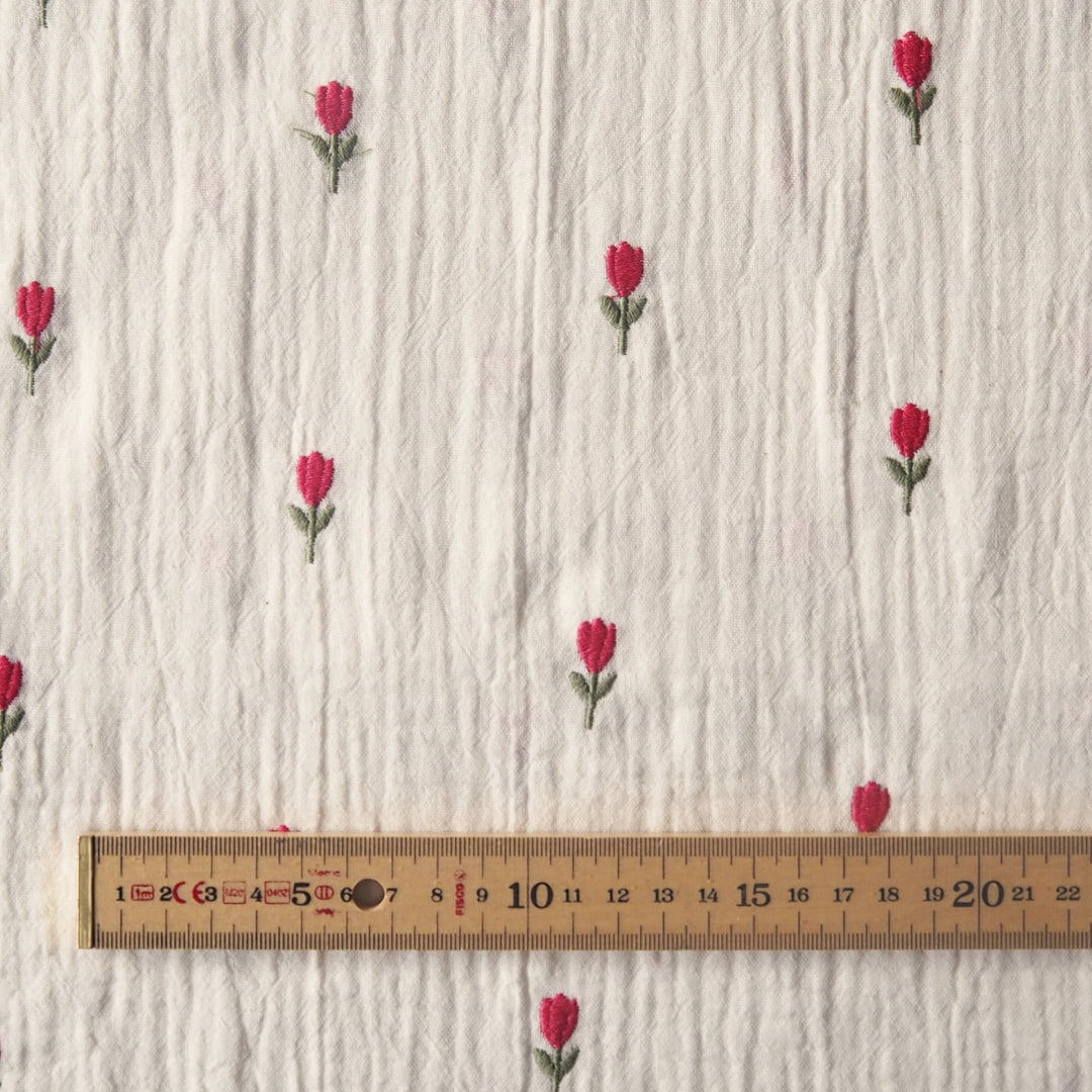 Ecru cotton double gauze fabric with embroidered tulip flowers