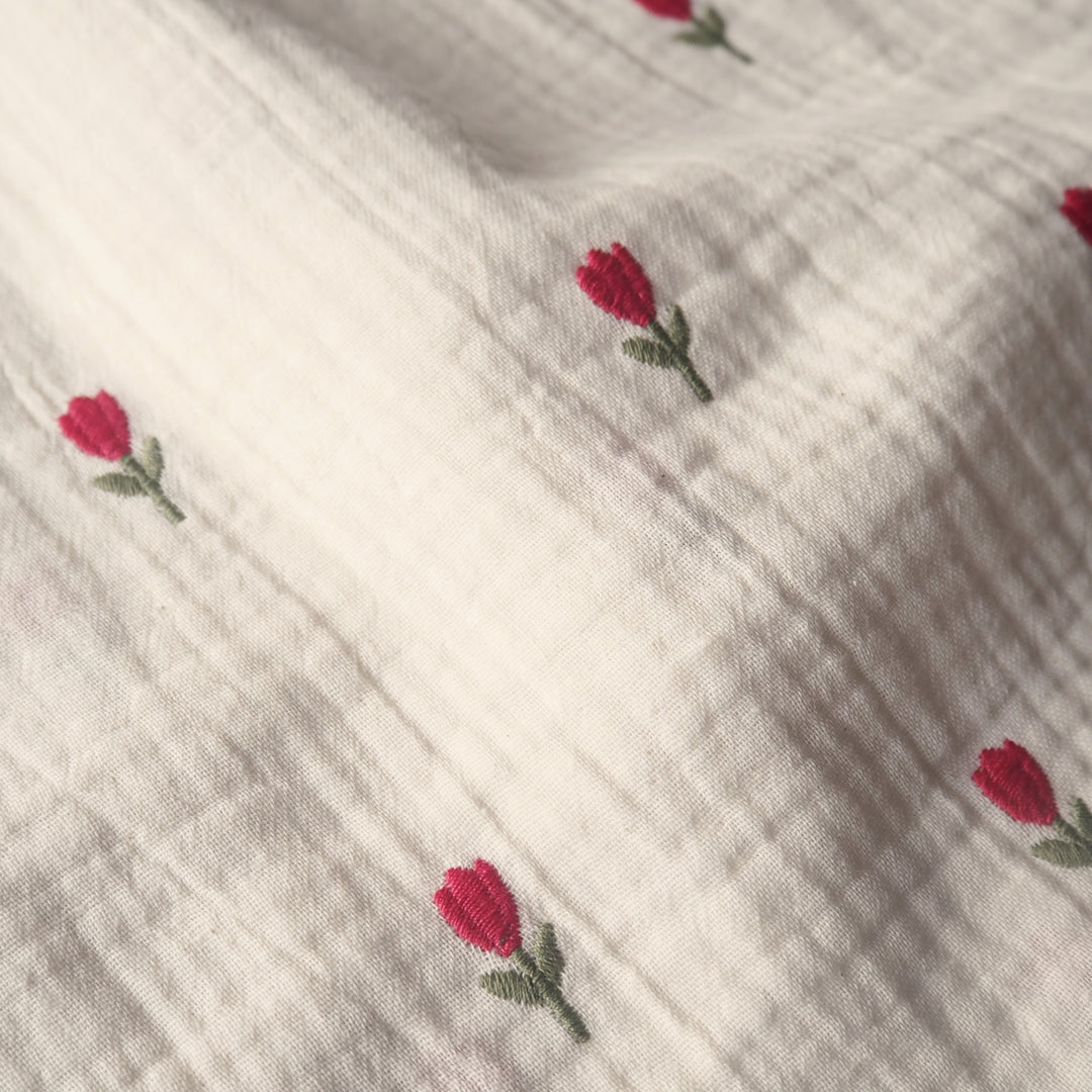 Ecru cotton double gauze fabric with embroidered tulip flowers