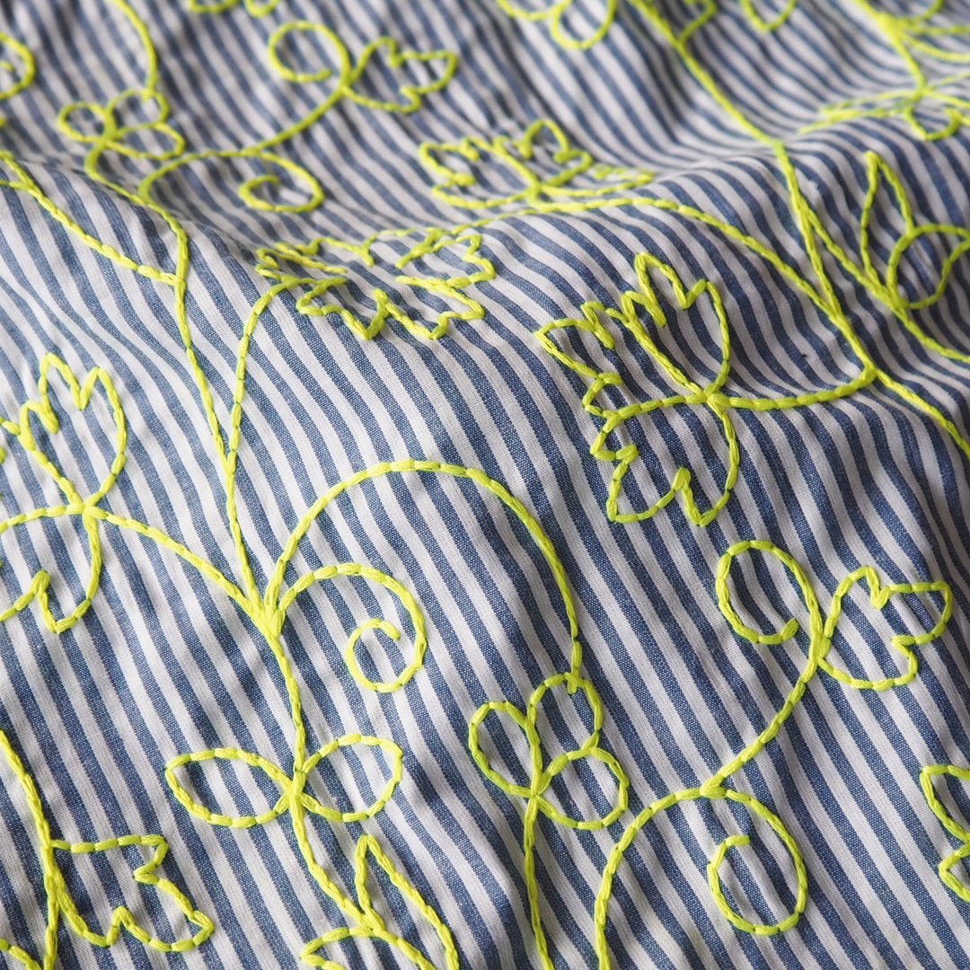 Neon embroidered floral striped cotton dressmaking fabric