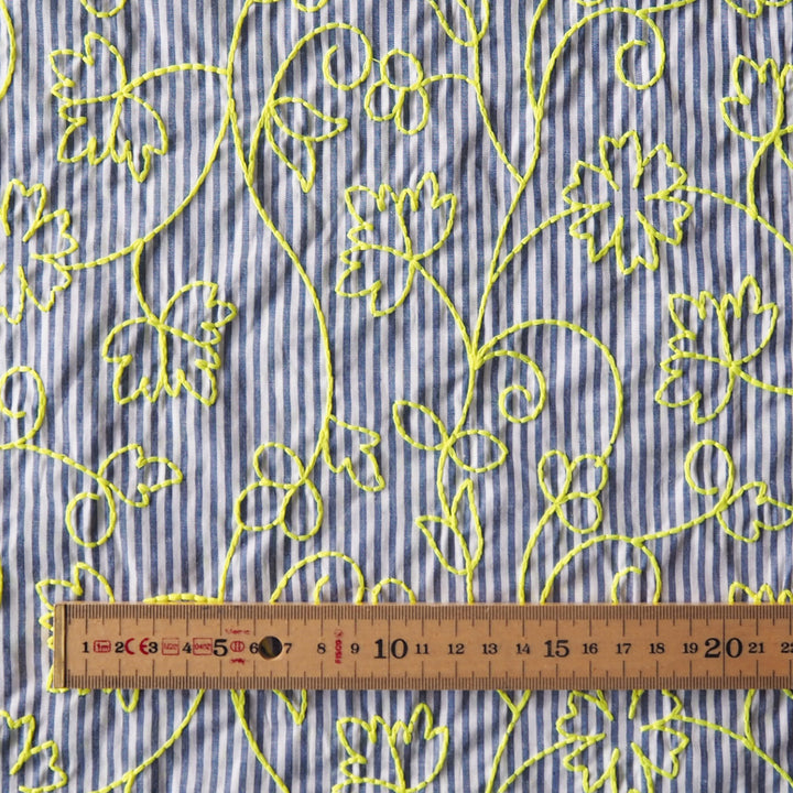 Neon embroidered floral striped cotton dressmaking fabric