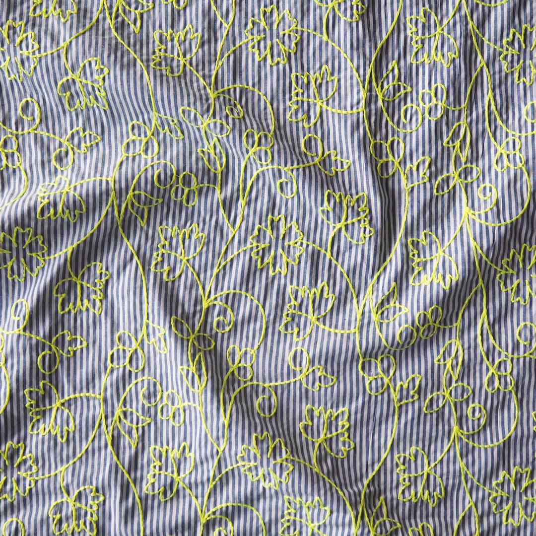 Neon embroidered floral striped cotton dressmaking fabric