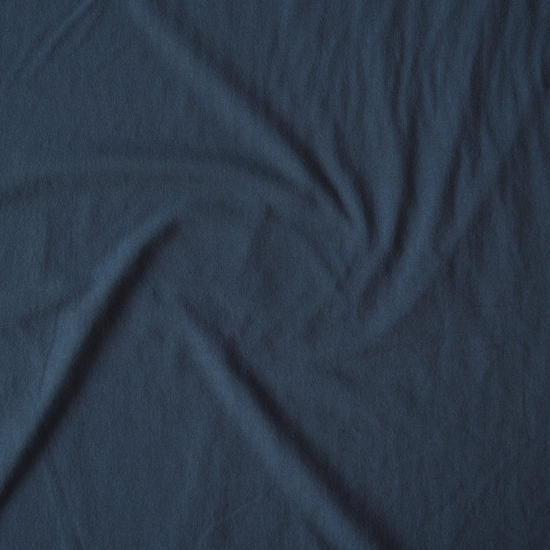 Heavy weight navy blue cotton jersey dressmaking fabric