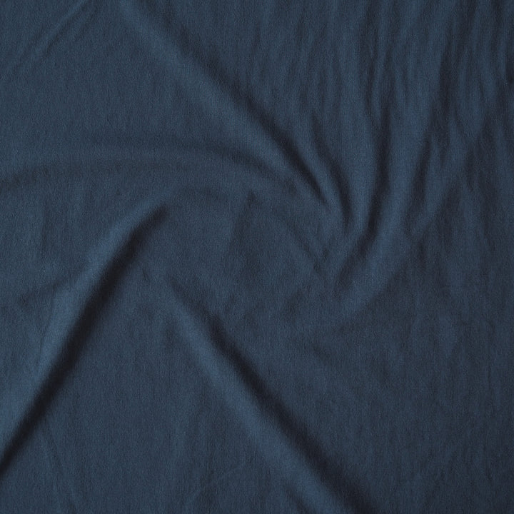 Heavy weight navy blue cotton jersey dressmaking fabric
