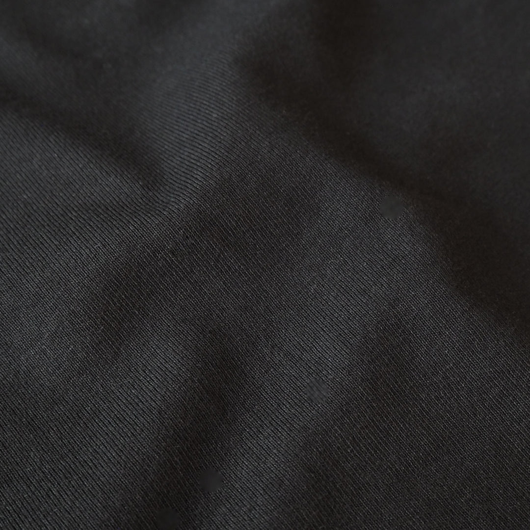 Heavy weight black cotton jersey dressmaking fabric