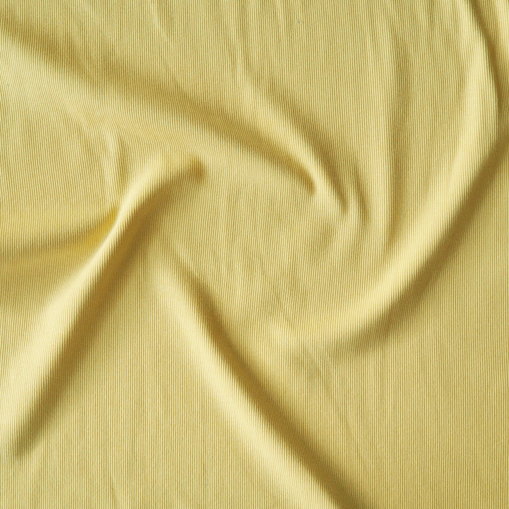 Soft yellow 2x2 cotton tubular ribbing fabric