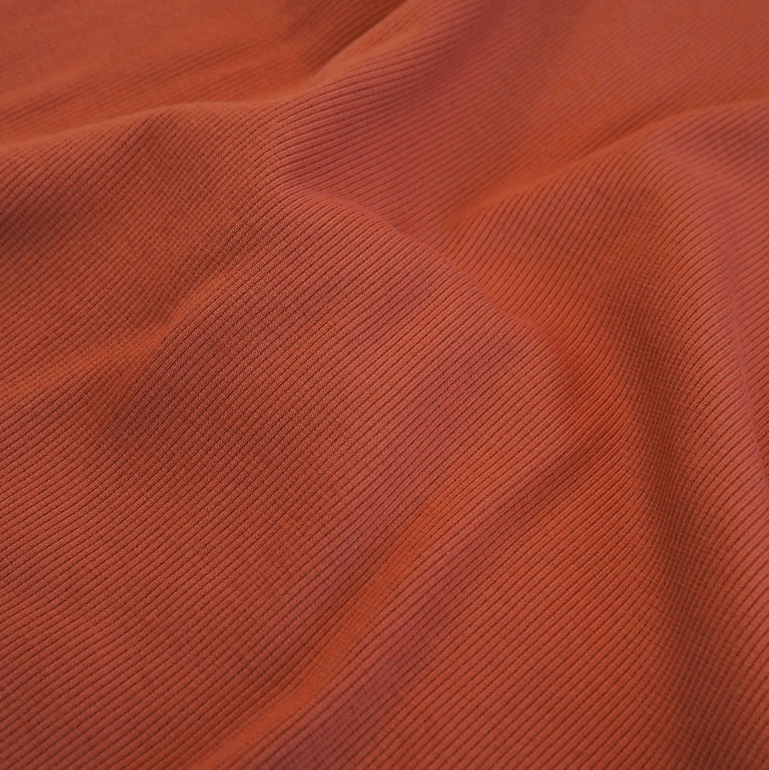 Deep orange rust 2x2 cotton tubular ribbing fabric