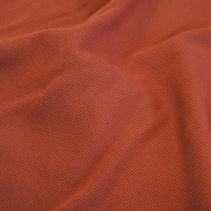 Deep orange rust 2x2 cotton tubular ribbing fabric