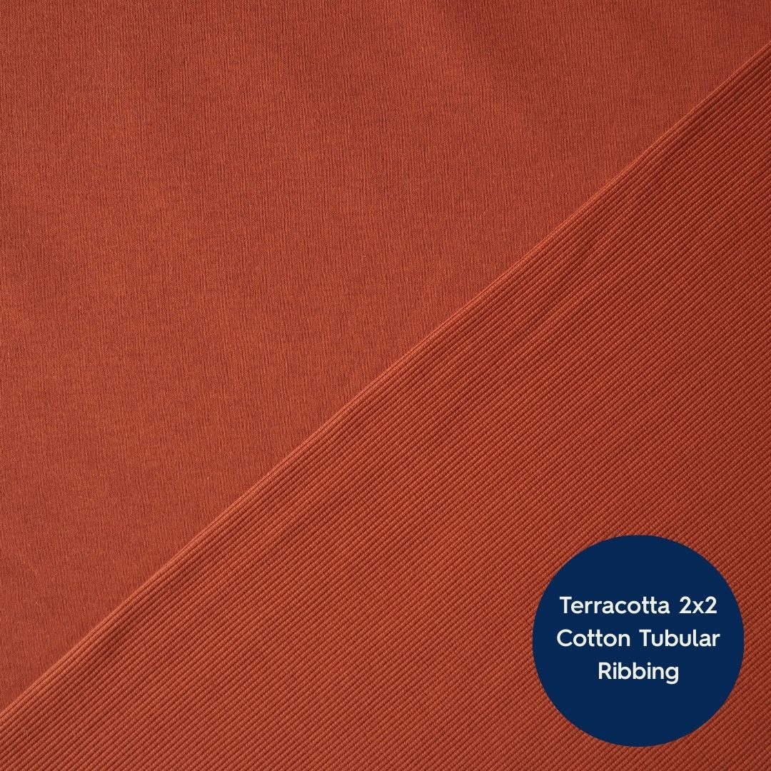 Terracotta fleeceback organic cotton sweatshirting fabric, cosy and stretchy for sweatshirts and joggers.