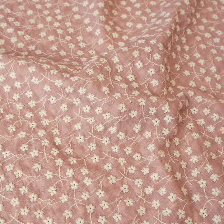 Rose pink embroidered cotton voile dressmaking fabric