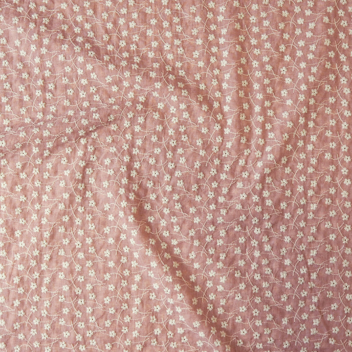 Rose pink embroidered cotton voile dressmaking fabric