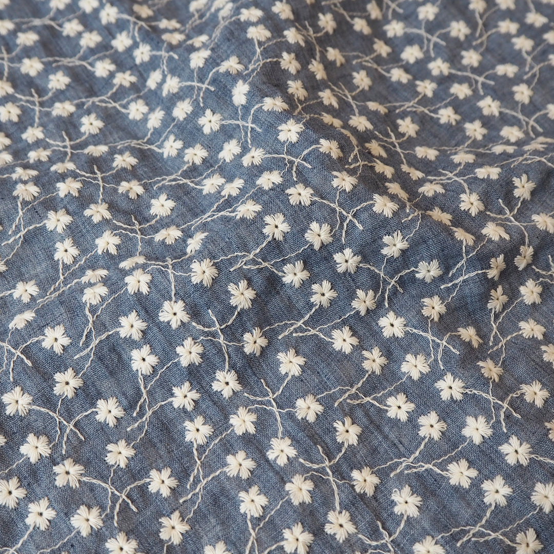 Denim blue embroidered cotton voile dressmaking fabric