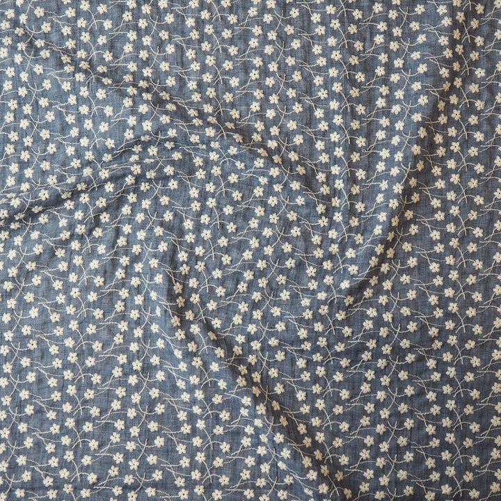 Denim blue embroidered cotton voile dressmaking fabric