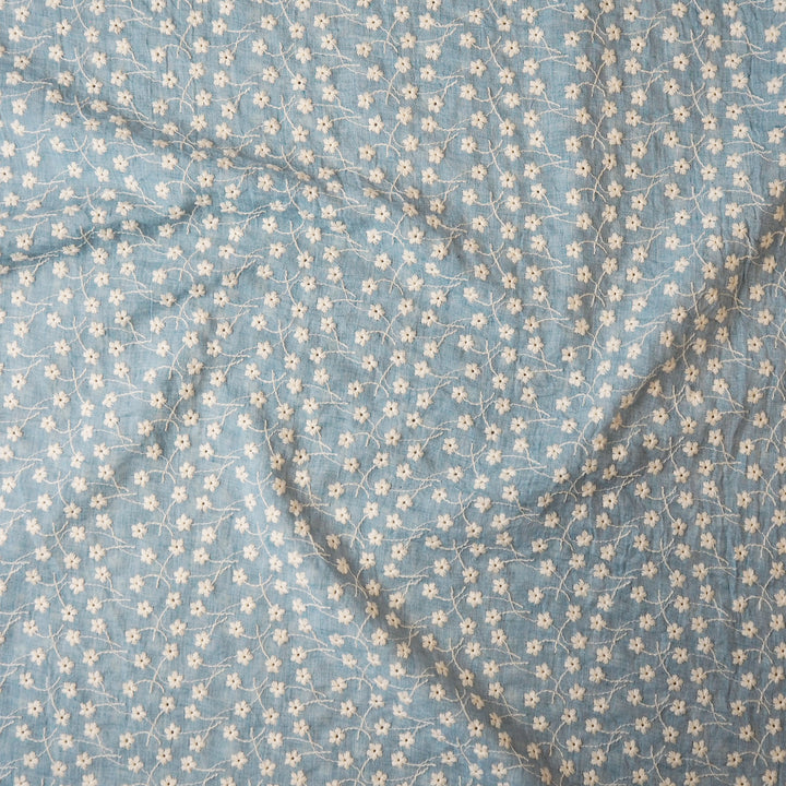 Sky blue embroidered cotton voile dressmaking fabric