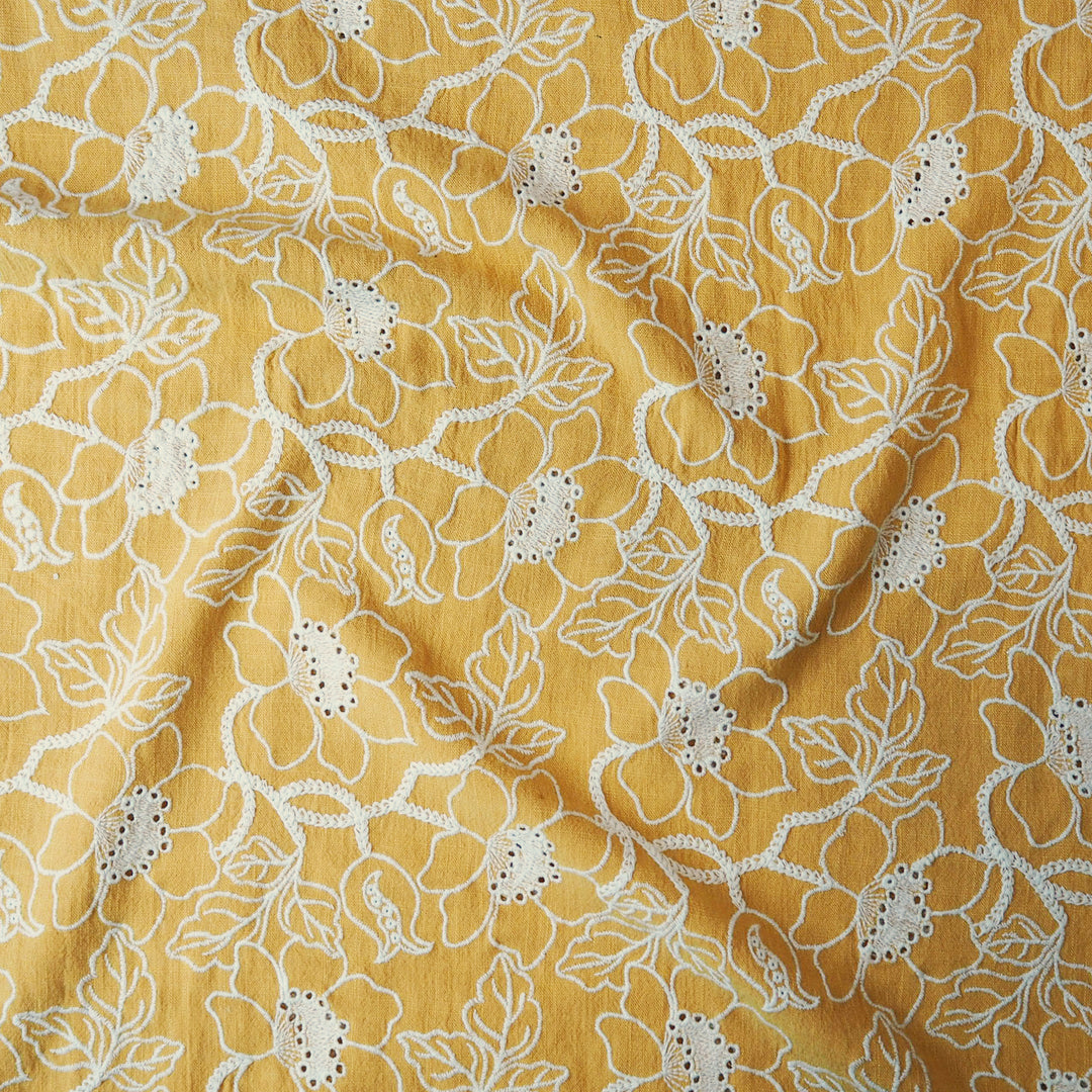 Mustard yellow floral embroidered viscose linen dressmaking fabric
