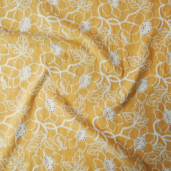 Mustard yellow floral embroidered viscose linen dressmaking fabric
