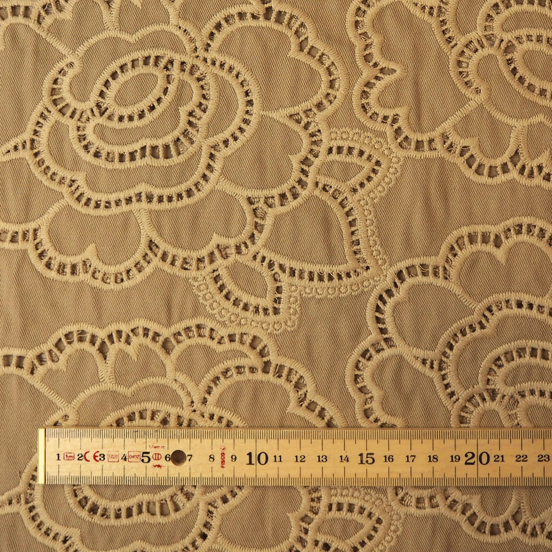 Beige cut-out floral denim fabric for dressmaking