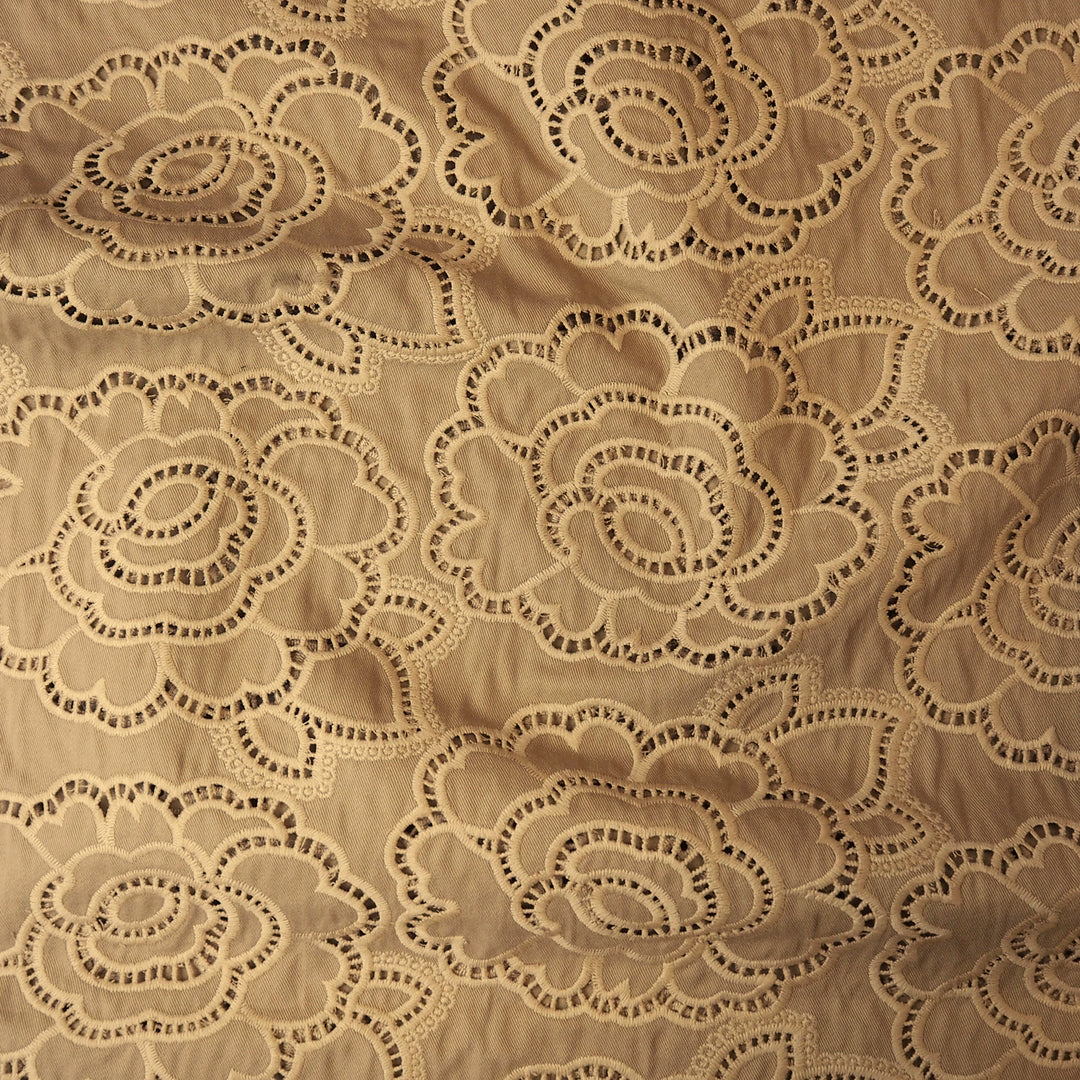 Beige cut-out floral denim fabric for dressmaking