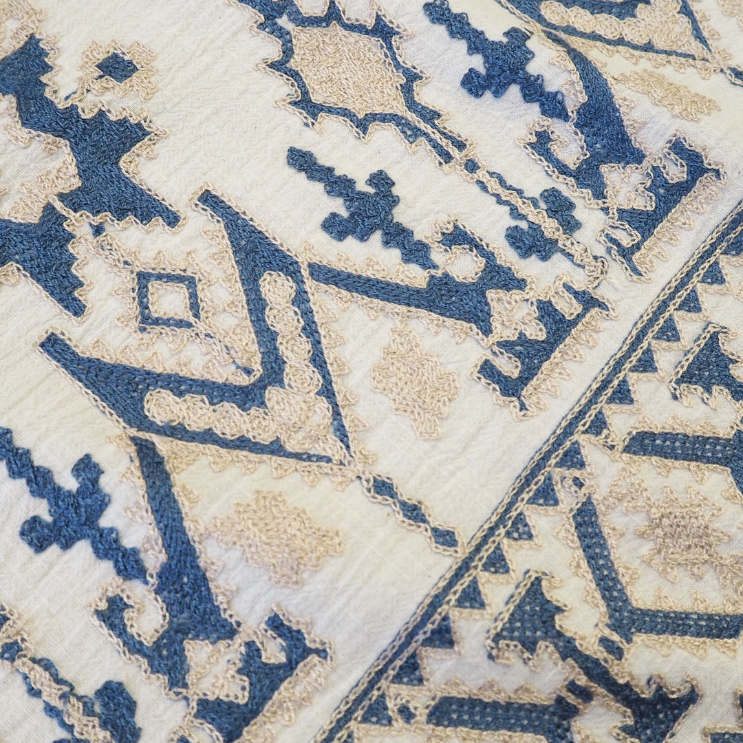 Geo border embroidered cotton blend dressmaking fabric