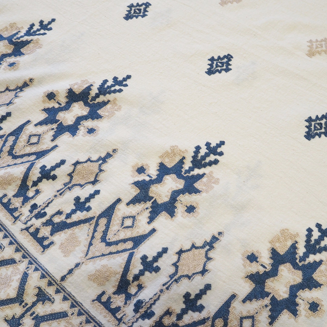 Geo border embroidered cotton blend dressmaking fabric