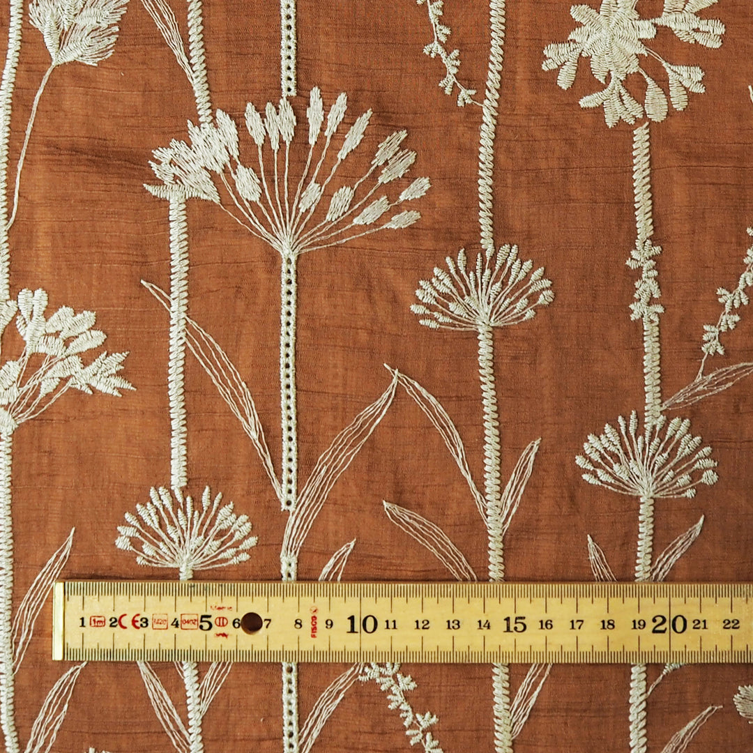 Rust embroidered stems lyocell blend fabric for dressmaking
