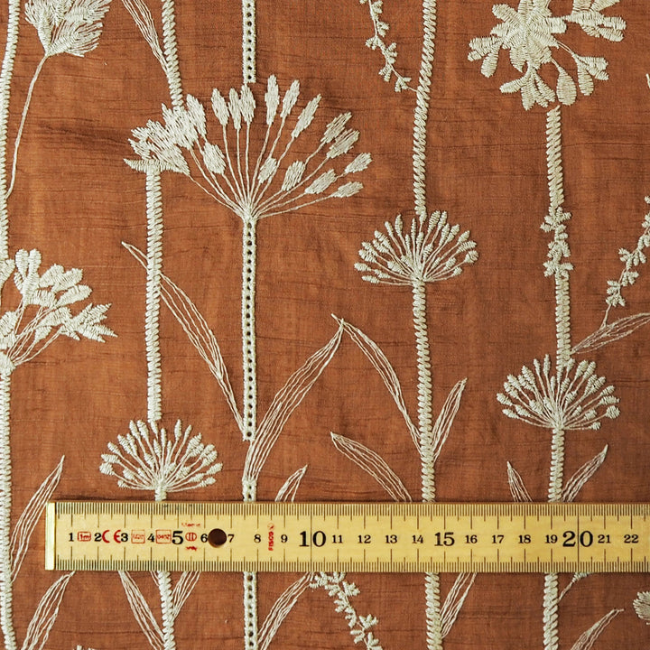 Rust embroidered stems lyocell blend fabric for dressmaking