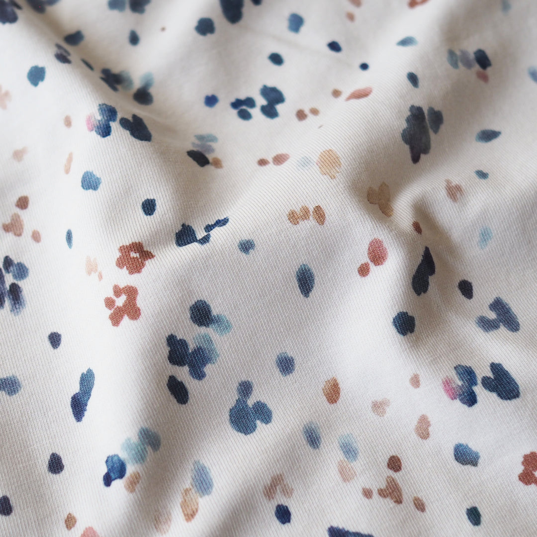 Pastel confetti organic cotton jersey stretch fabric for dressmaking