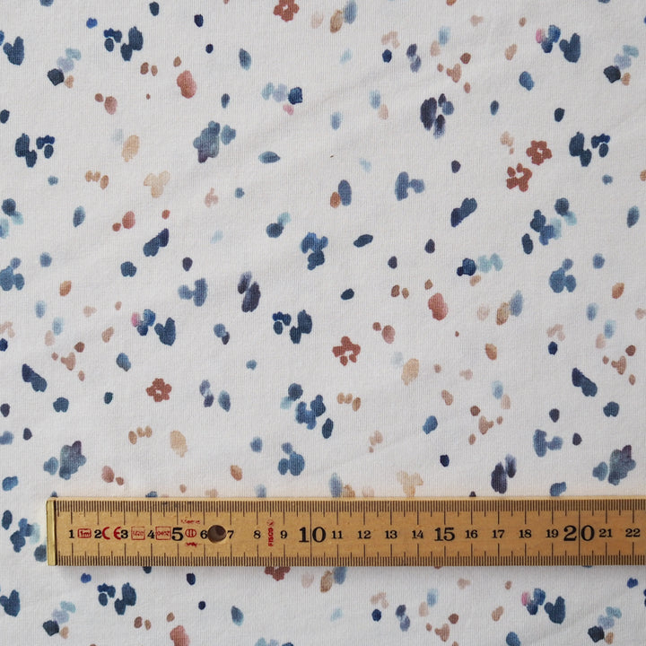 Pastel confetti organic cotton jersey stretch fabric for dressmaking