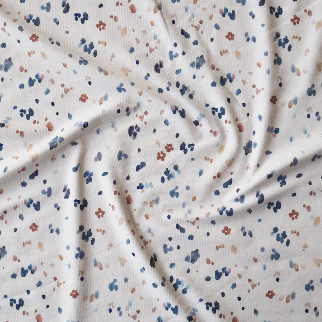 Pastel confetti organic cotton jersey stretch fabric for dressmaking